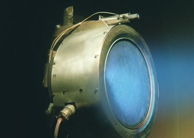 A NSTAR ion engine discharging in a NASA vacuum facility (image source: NASA).