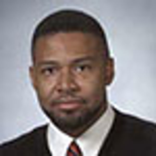 Dr. John E. Foster